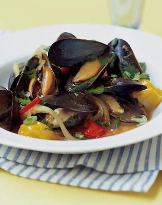 Fish Still Life Photograph - A Thai Dish Of Mussels And Papaya by Romulo Yanes