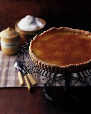 Baking Wall Art featuring the photograph A Vinegar Pie On A Wire Stand by Romulo Yanes