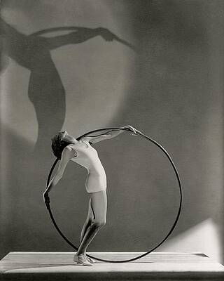 Dancer in Graceful Pose with Hoop Photograph