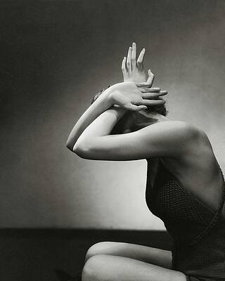 Elegant Pose with Hidden Face Photograph