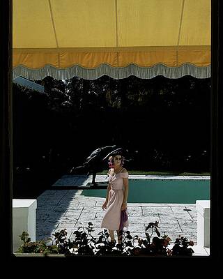 Woman by the Poolside Awning Wall Art