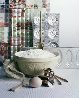Bowl Wall Art featuring the photograph A Wooden Spoon In A Bowl Of Flour by Richard Jeffery