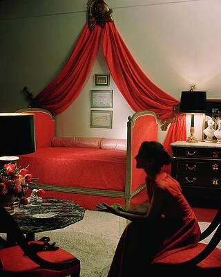 Elegant Red Bedroom Scene Photograph