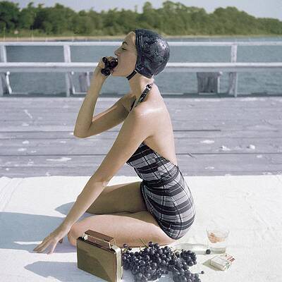 Vintage Woman Sunbathing By the Pier Wall Art