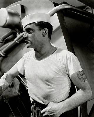 Sailor Wall Art featuring the photograph Actor James Cagney Wearing A Sailor Hat by George Hoyningen-Huene