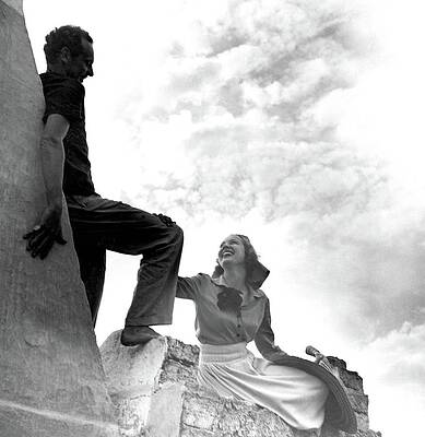 Joyful Moment on Stone Structure Photograph