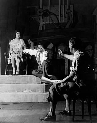 Theatrical Rehearsal Scene with Three Actors Photograph