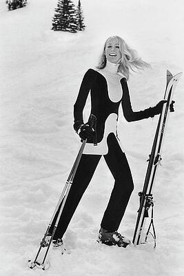 Woman Enjoys Skiing in Snowy Landscape Photograph