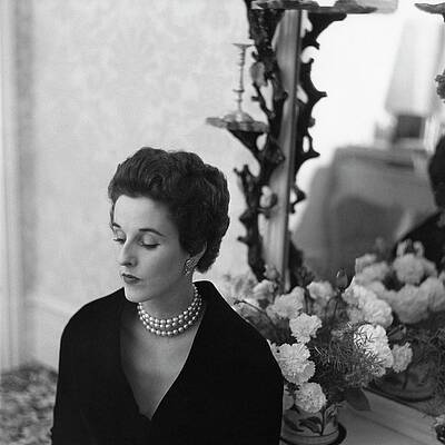 Elegant Wall Art featuring the photograph Babe Paley Looking Elegant In A Pearl Necklace by Frances McLaughlin-Gill