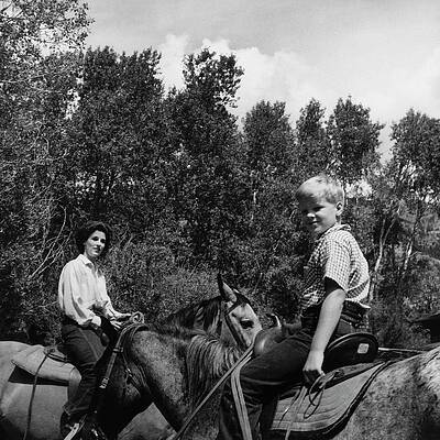 Mother and Son Horseback Riding Adventure Photograph