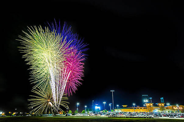 Colorful Fireworks Over Cityscape Photograph