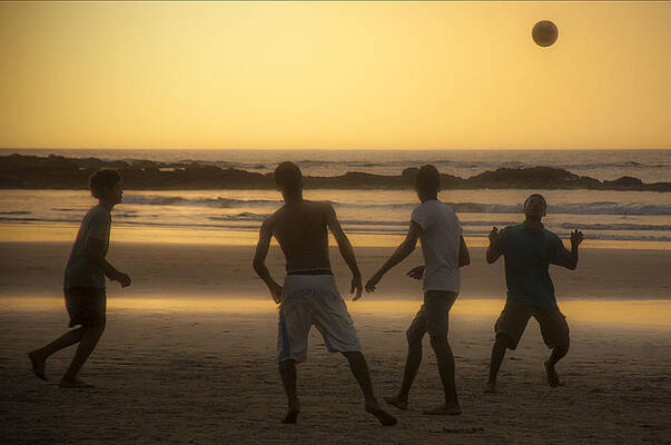 Wall Art featuring the photograph Beach Soccer At Sunset by Owen Weber