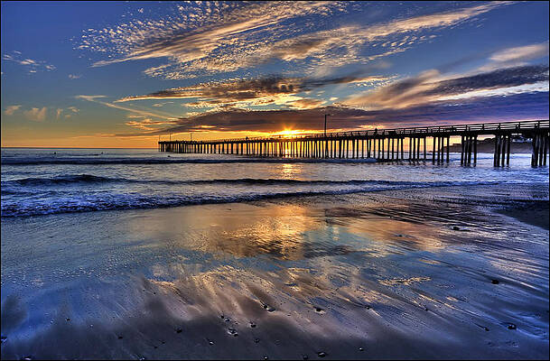 Sunset Over an Ocean Pier Photograph
