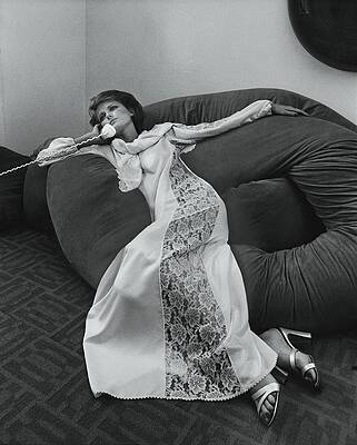 Lace Wall Art featuring the photograph Cheryl Tiegs Wearing A Fernando Sanchez Nightgown by Kourken Pakchanian