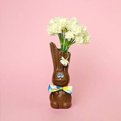 Wall Art featuring the photograph Chocolate Rabbit Vase With Flowers by Juj Winn