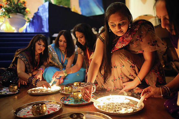 Wall Art featuring the photograph Diwali And Annakut Are Celebrated At by Dan Kitwood