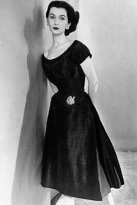 Elegant Woman in Vintage Dress Photograph