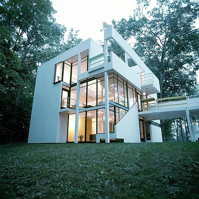 Modern Architectural Home in Forest Setting Photograph