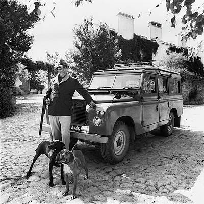 Drive Wall Art featuring the photograph Fernando Fernandez Holding A Winchester Gun by Leonard Nones