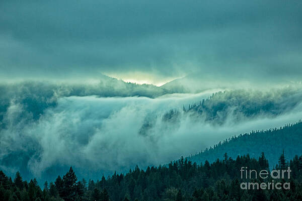 Glacier National Park Photograph - Fog Rolling Over The Montana Rocky Mountains by Natural Focal Point Photography