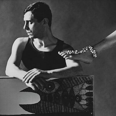 Man and Ornate Foot with Beads Photograph