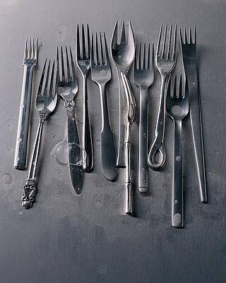 Fork Wall Art featuring the photograph Group Of Clean Forks by Romulo Yanes