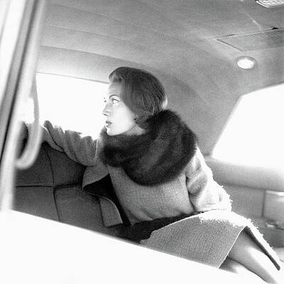 Elegant Woman in Vintage Car Photograph