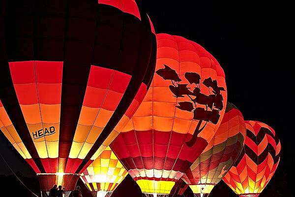 Wall Art featuring the photograph Hot Air Balloon Night Glow by Jeff Sinon