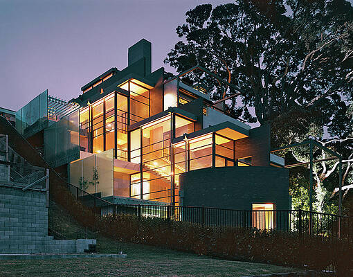 Illuminate Photograph - House With Pohutukawa Tree At Night by Erhard Pfeiffer