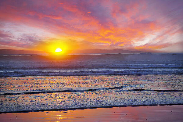Sunset Over Ocean Waves Photograph