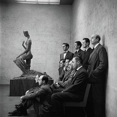 Men in a Gallery Viewing Sculpture Photograph