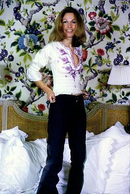 Woman Smiling in Floral Room Photograph