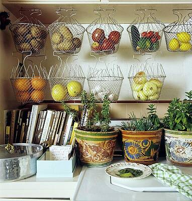 Kitchen Shelves with Hanging Baskets Photograph