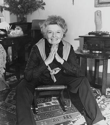 Smiling Woman in Living Room Photograph