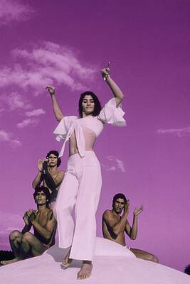 Wall Art featuring the photograph La Chichi Dancing With Her Brothers by Raymundo de Larrain