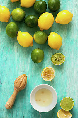 Lemons and Limes on Blue Table Wall Art