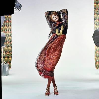 Black Background Wall Art featuring the photograph Loulou De La Falaise Wearing Silk by Bert Stern