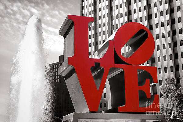 Love Sculpture with Urban Backdrop Photograph