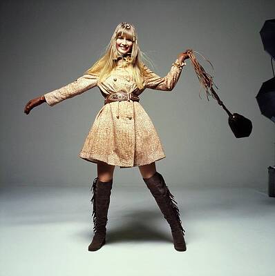 Elegant Wall Art featuring the photograph Lynn Sutherland Wearing An Originala Coat by Bert Stern