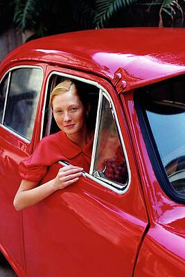 Lady in Vintage Red Car Photograph