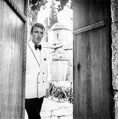 Elegant Man in White Tuxedo Photograph