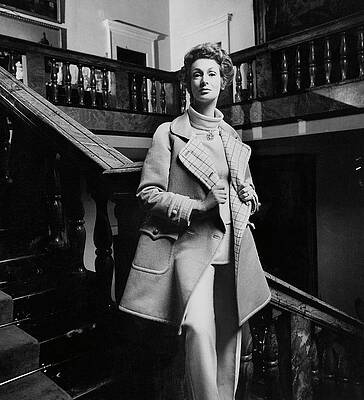 Staircase Photograph - Marella Agnelli Wearing A Courreges Raincoat by Henry Clarke