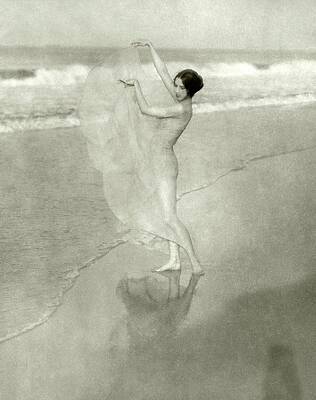 Woman Dances by the Shoreline Wall Art