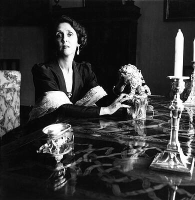 Elegant Woman at Reflective Table Wall Art