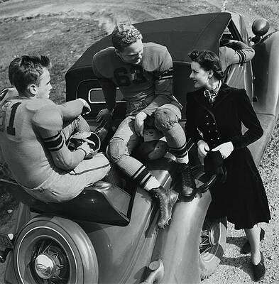 Football Players and Model on Vintage Car Photograph