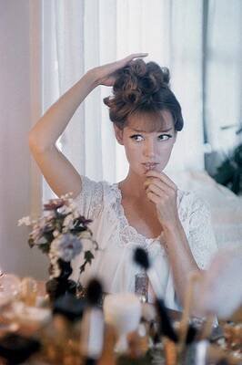 Woman Preparing for a Day Out Wall Art