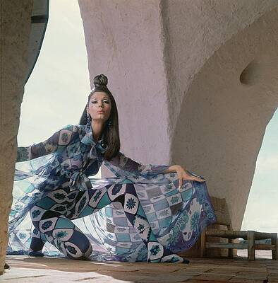 Brunette Wall Art featuring the photograph Model Wearing A Chiffon Voile Coat by Henry Clarke