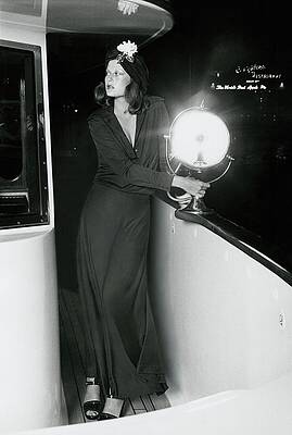 Illuminate Photograph - Model Wearing A Geoffrey Beene Ensemble On A Boat by Kourken Pakchanian