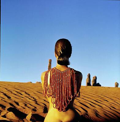 Desert Photograph - Model Wearing A Red Beaded Necklace by John Cowan