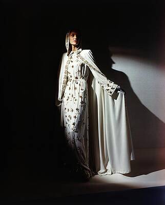 Illuminate Photograph - Model Wearing Dress With Cape by Horst P. Horst
